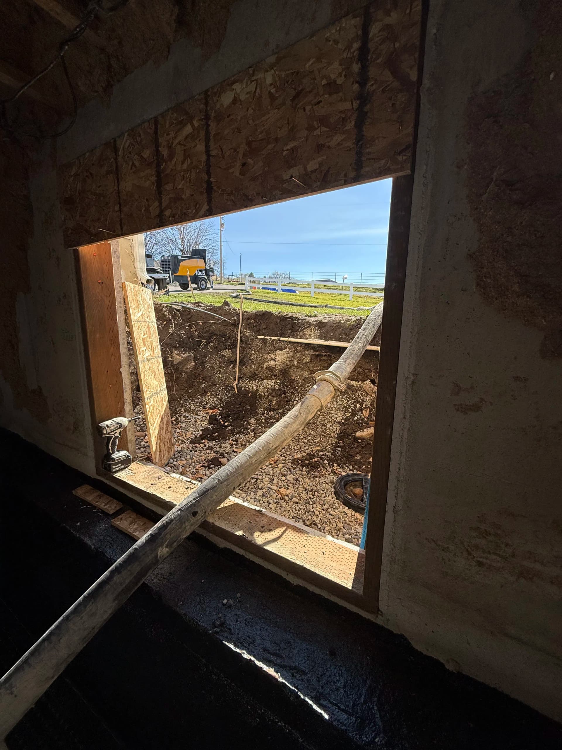 Gallery photos for Basement Concrete Pour Using a Line Pump Through the Window: Image #1